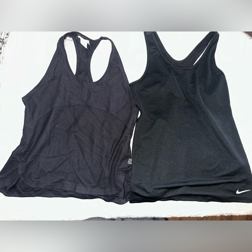 2 pairs of women's size L Nike Women’s Black Tanks